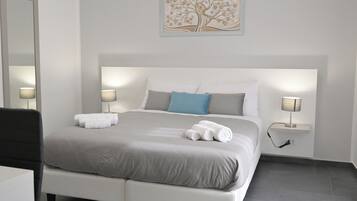 Comfort Room, City View | Memory foam beds, free minibar, desk, free WiFi