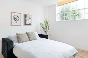 1 chambre, fer et planche à repasser, accès au Wi-Fi (inclus)