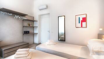 2 bedrooms, in-room safe, iron/ironing board, travel cot