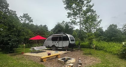 Cozy RV on 149 acres in Charleston with AC, WiFi, and eight miles of trails!