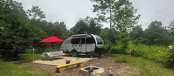 Cozy RV on 149 acres in Charleston with AC, WiFi, and eight miles of trails!