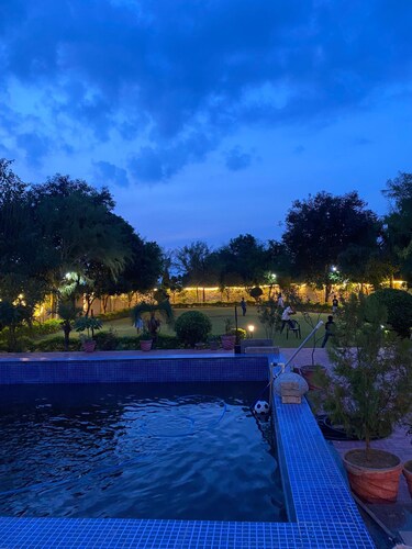 Nestled amidst majestic mountains, our farmhouse offers a serene and picturesque