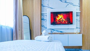 Deluxe-Dreibettzimmer | Fernseher