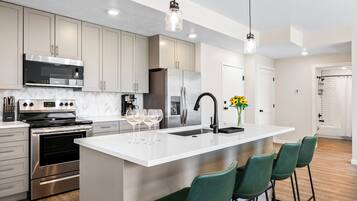 Condo, 2 Bedrooms | Private kitchen | Fridge, oven, coffee/tea maker, toaster