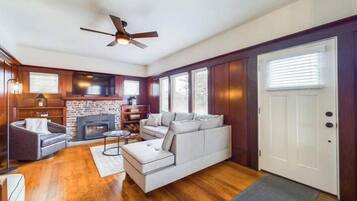 Smart TV, fireplace, books