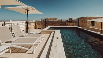 Outdoor pool, open 10:00 AM to 8:00 PM, sun loungers