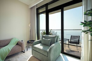 Comfort Apartment, Balcony, Ocean View | Living area | 75-inch Smart TV with cable channels, Netflix, streaming services