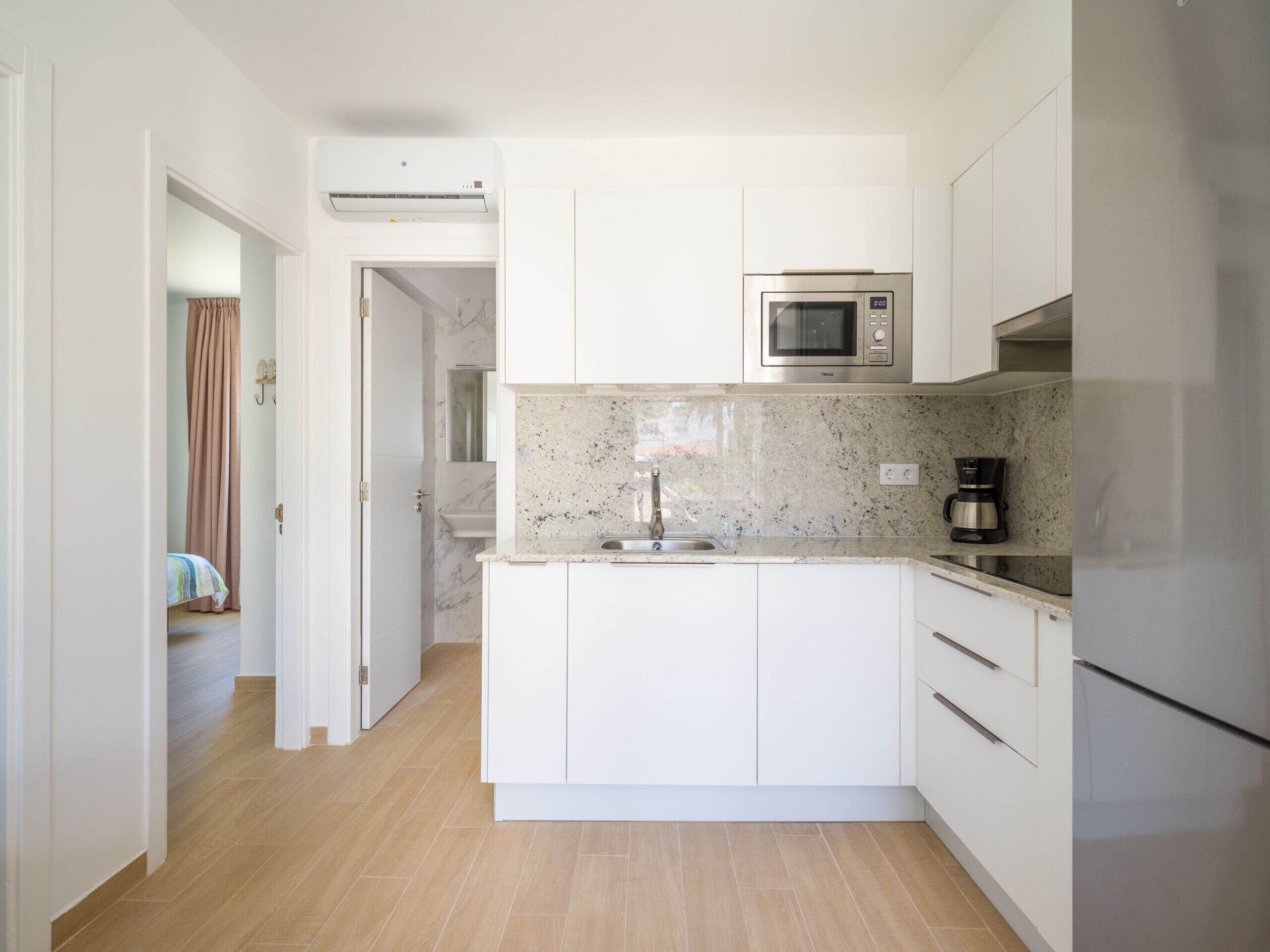 Fridge, microwave, coffee/tea maker, electric kettle