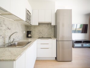 Fridge, microwave, coffee/tea maker, electric kettle