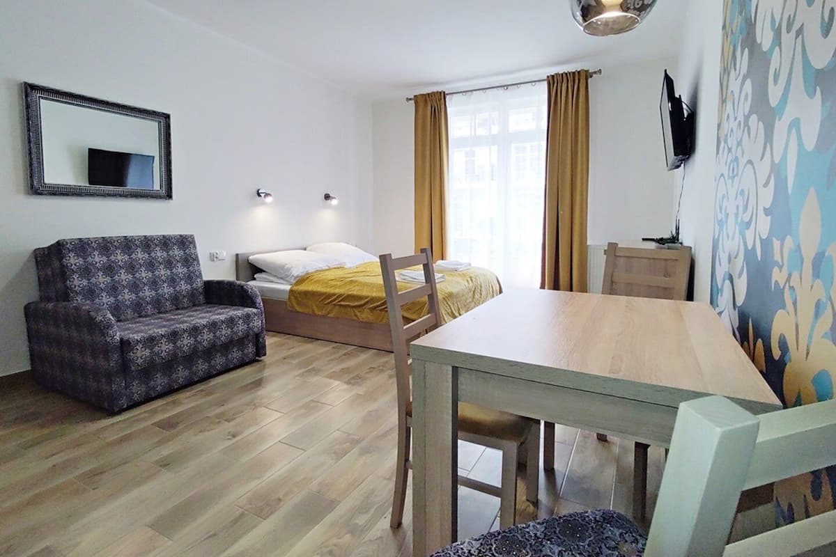 Suite estudio estándar, 1 cama Queen size y sofá cama | 1 habitación, decoración personalizada y muebles diferentes