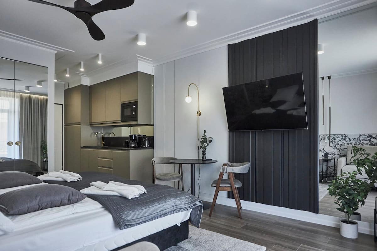 Suite estudio superior, 1 cama Queen size y sofá cama | 1 habitación, decoración personalizada y muebles diferentes