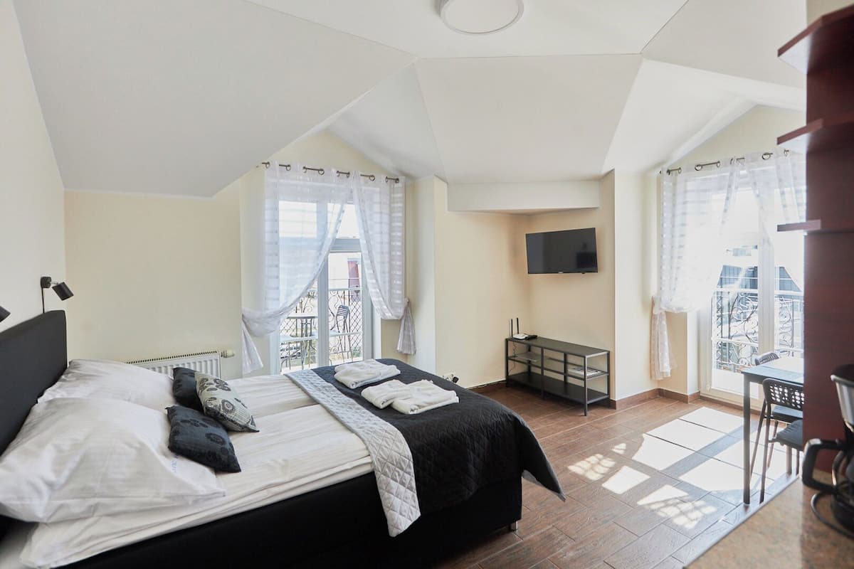 Suite estudio estándar, 1 cama Queen size | 1 habitación, decoración personalizada y muebles diferentes