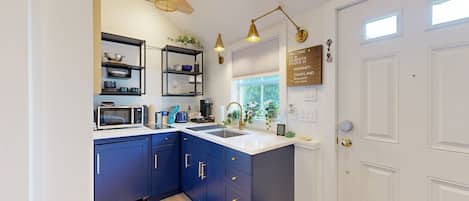 Microwave, stovetop, coffee/tea maker, toaster
