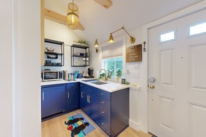 Microwave, stovetop, coffee/tea maker, toaster