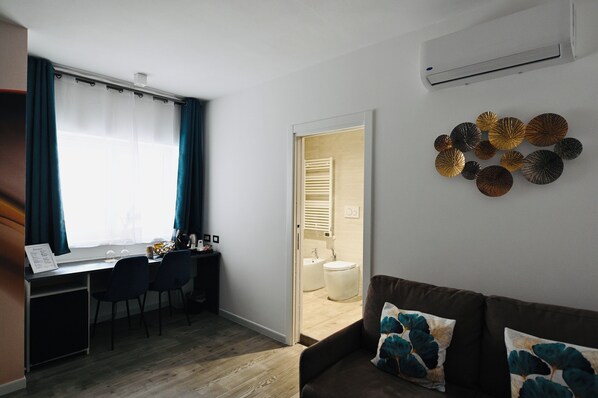 Chambre Triple Deluxe | Climatisation