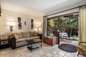 Condo, 1 King Bed with Sofa bed, Patio, Garden View (Casa de Emdeko 109 - vrKCV) | Living area | 42-inch flat-screen TV with digital channels