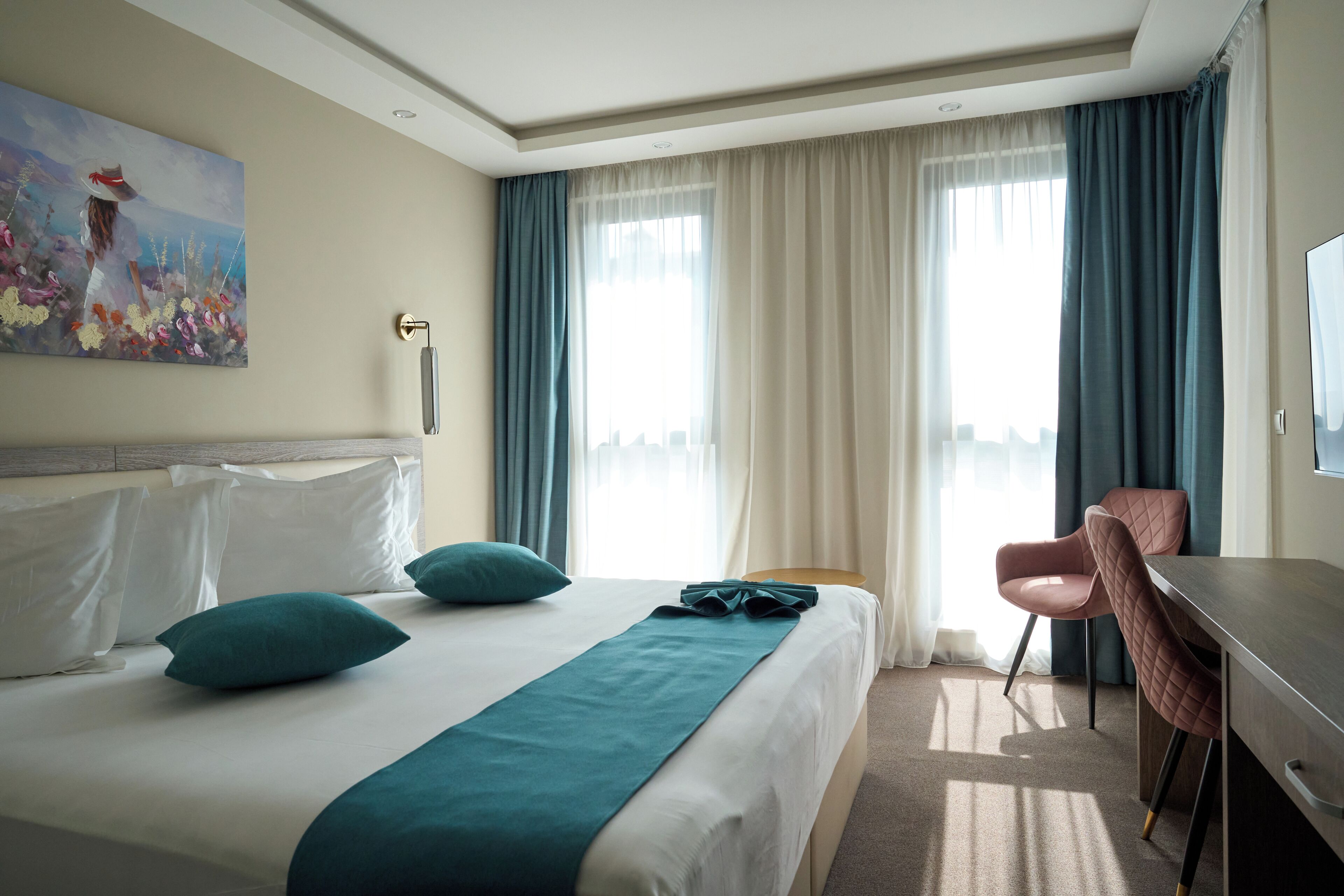 Deluxe Double Room with Balcony | In-room safe, desk, laptop workspace, blackout drapes