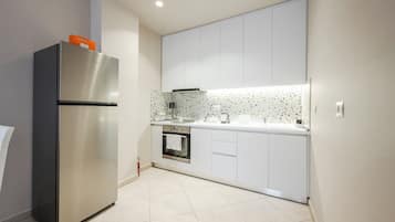 Junior Apartment, Balcony, Mountain View | Private kitchen | Electric kettle, toaster, high chair