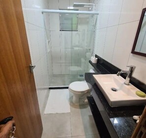 Hair dryer, towels, soap, shampoo