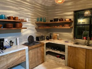 Fridge, stovetop, coffee/tea maker, toaster