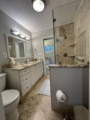 Shower, hair dryer, towels, soap