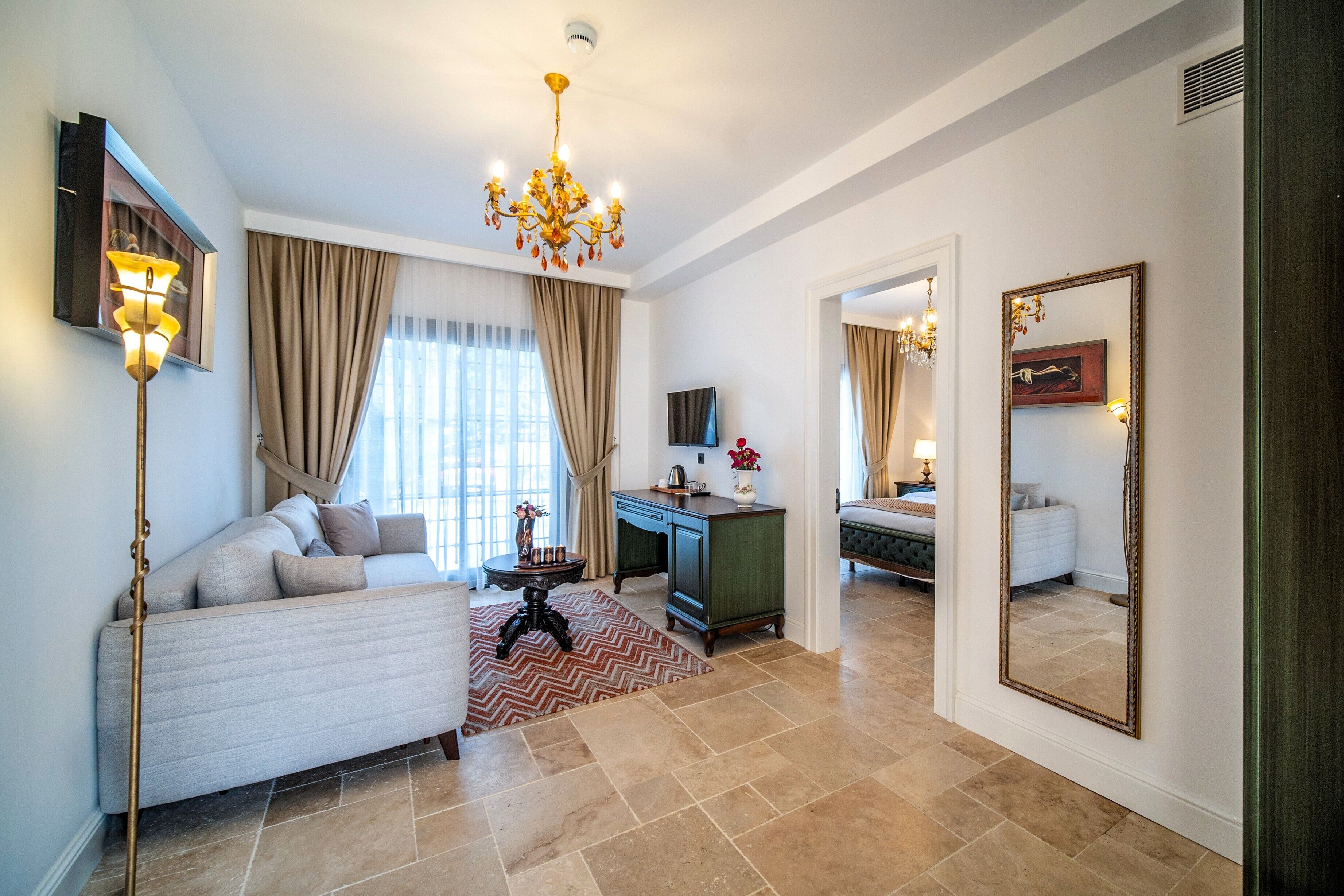 Premium Quadruple Room, 1 Bedroom, City View, Poolside | Living area | 82-inch LCD TV with satellite channels, books, stereo