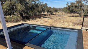 A glass-bottomed hot tub on a wooden deck with a '3 FT' depth limit and a 'NO DIVING' sign. - Unit #5 - Modern Tiny Home in the heart of TX Wineries (Johnson City)