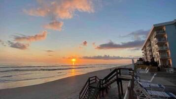 On the beach, sun loungers, beach towels