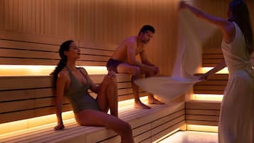 A sauna with wooden benches and benches.