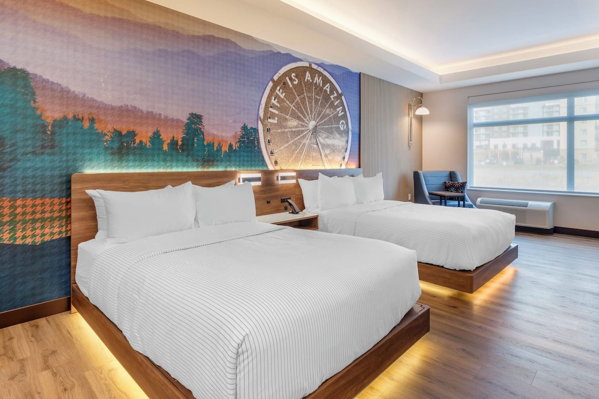 Premium bedding, desk, laptop workspace, blackout curtains