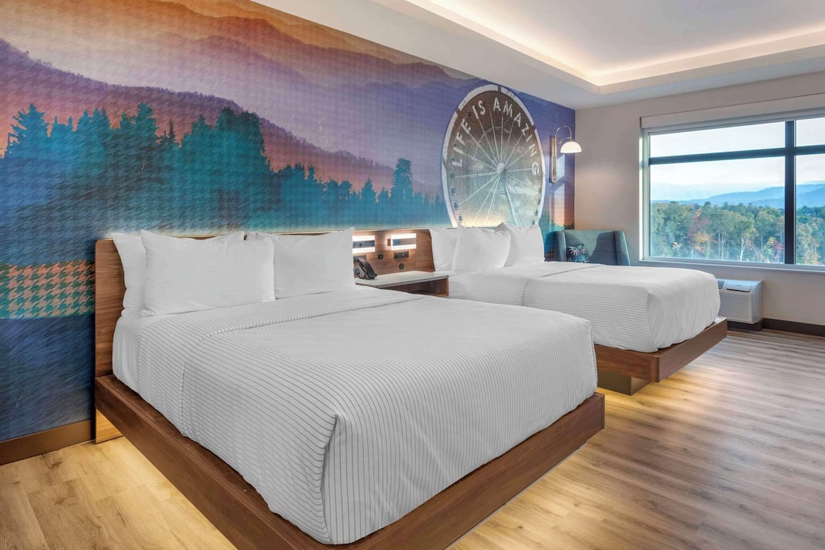 Premium bedding, desk, laptop workspace, blackout curtains