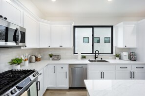 Fridge, microwave, oven, stovetop - Brand New Downtown 3BR Condo - Walk to Everything! (Sacramento)