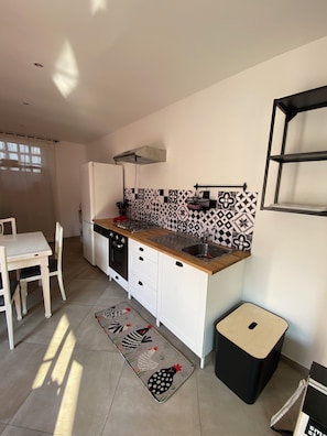 Private kitchen - Quadrifoglio Apartment - Nice and spacious studio apartment in the center of town (Meina)