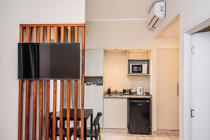 Suite Supérieure, balcon | Coffres-forts dans les chambres, rideaux occultants, Wi-Fi gratuit