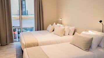 Triple Room | Blackout curtains, free WiFi, bed sheets
