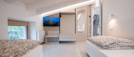 2 slaapkamers, een strijkplank/strijkijzer, gratis wifi, beddengoed