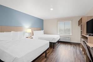 Desk, laptop workspace, free WiFi, bed sheets