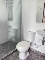 Basic Triple Room | Bathroom | Shower, towels, soap, toilet paper