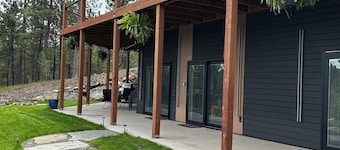 Casa del Sol is a private oasis surrounded by trees near Pactola Lake. 