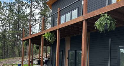 Casa del Sol is a private oasis surrounded by trees near Pactola Lake.