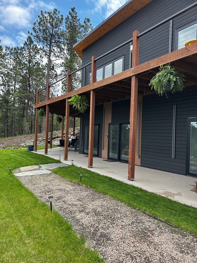 Casa del Sol is a private oasis surrounded by trees near Pactola Lake.