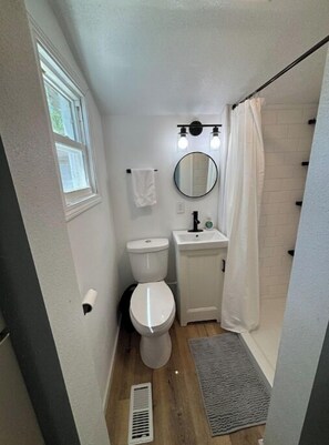 Shower, towels, soap, shampoo