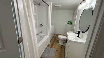 Shower, towels, toilet paper