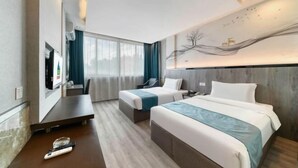 A hotel room with two beds, a desk, a TV, and a large window with curtains. - Chuangejia Yuerongzhuang Hotel (Yongkang East Bus Station Exhibition Center) (Yongkang)