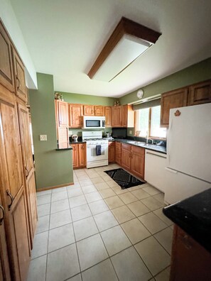 Large open Kitchen with view of the lake - "Villa Lago" Charming 4 bedroom 3 bath Farm Island Lake home with 3 fire places (Aitkin)