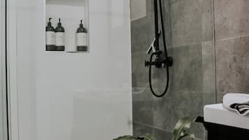 Shower, eco-friendly toiletries, hair dryer, towels