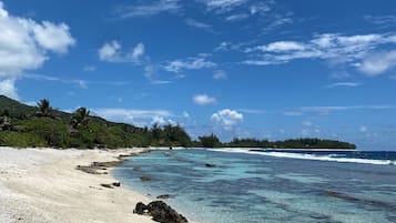On the beach, white sand, beach towels