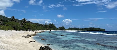 On the beach, white sand, beach towels