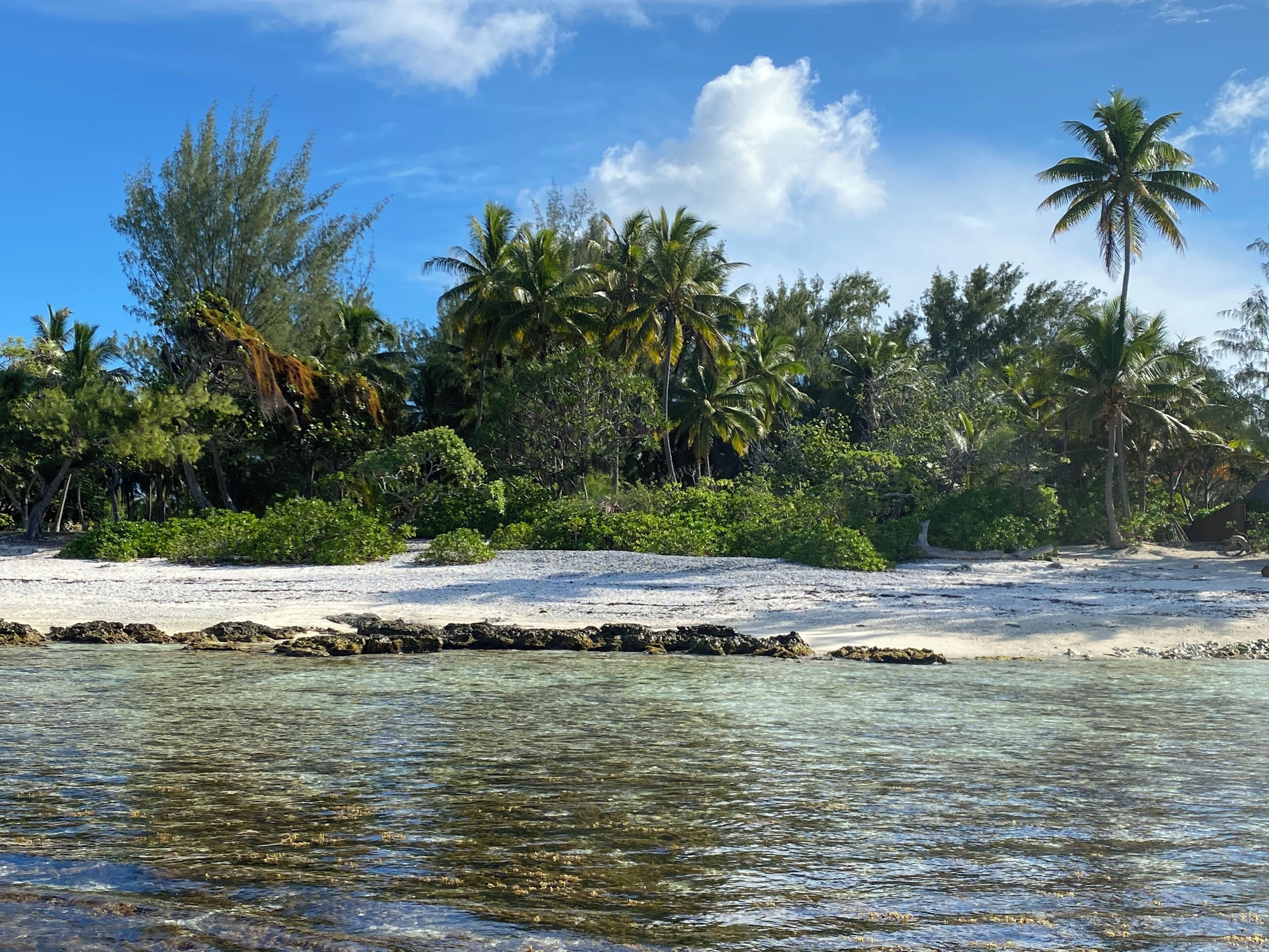 On the beach, white sand, beach towels