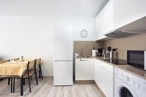 Microwave, stovetop, coffee/tea maker, high chair